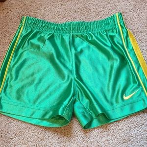 Green Nike shorts